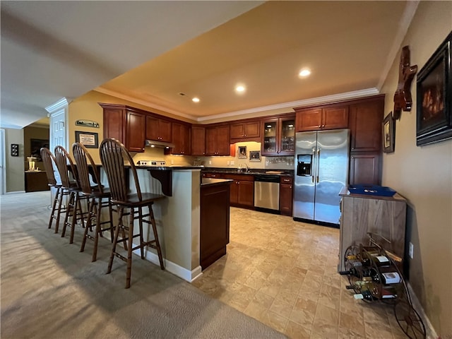 261 Patriot Ln, Economy, PA 15042 - kitchen featuring stainless steel appliances, dark countertops, a peninsula, glass insert cabinets, and ornate columns