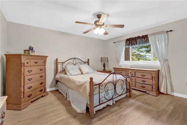 1410 Kenzie Dr, Robinson Twp, PA 15205 - bedroom featuring light wood finished floors and ceiling fan