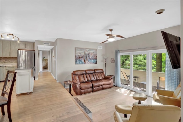 1410 Kenzie Dr, Robinson Twp, PA 15205 - living room with light wood-style flooring, ceiling fan, and track lighting