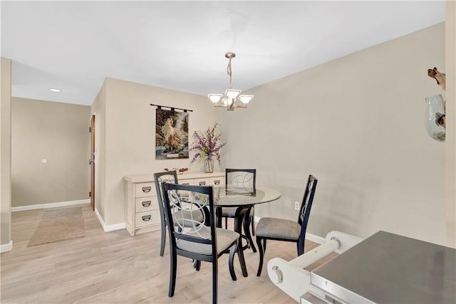 1410 Kenzie Dr, Robinson Twp, PA 15205 - dining room with light wood finished floors, a chandelier, and recessed lighting