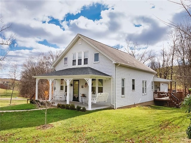 670 Sugar Camp Rd, Finleyville, PA 15332 - view of front of home featuring a front yard, covered porch, and roof with shingles