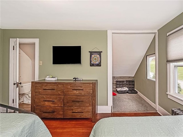 670 Sugar Camp Rd, Finleyville, PA 15332 - bedroom with radiator heating unit, wood finished floors, and vaulted ceiling