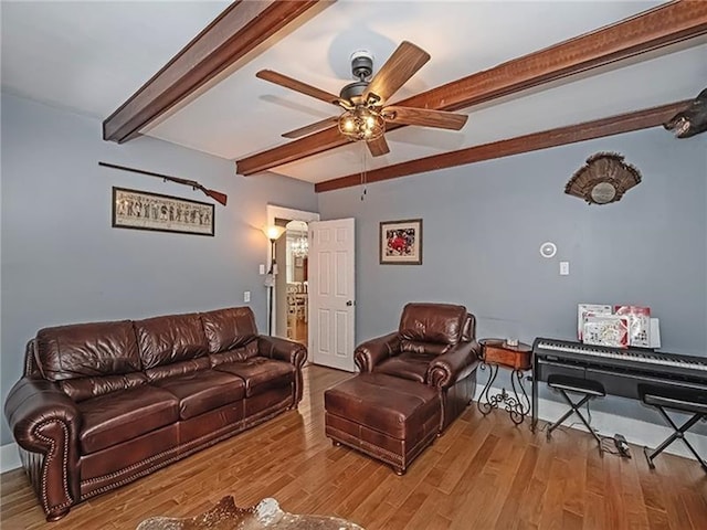 670 Sugar Camp Rd, Finleyville, PA 15332 - living area featuring beam ceiling, ceiling fan, and wood finished floors