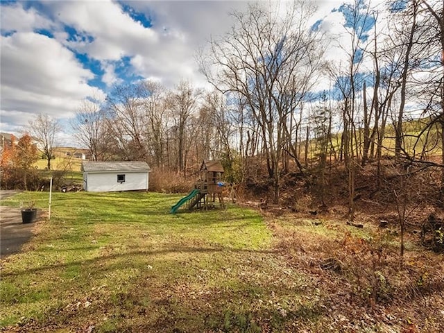670 Sugar Camp Rd, Finleyville, PA 15332 - view of green lawn with a playground and an outdoor structure