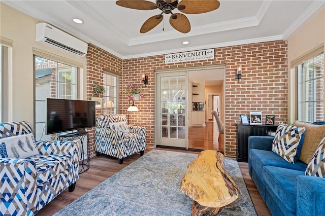 532 Salem Heights Dr, Pine Twp Nal, PA 15044 - living area featuring a wall mounted AC, wood finished floors, a raised ceiling, ceiling fan, and brick wall