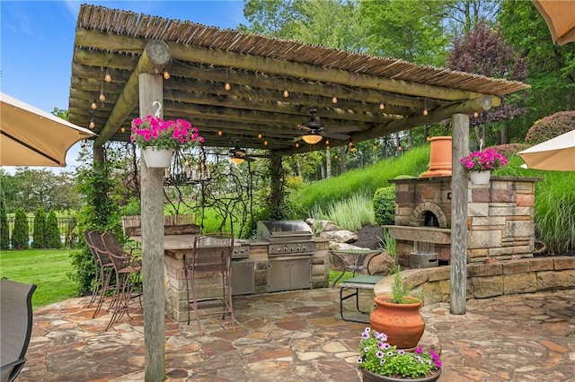 532 Salem Heights Dr, Pine Twp Nal, PA 15044 - view of patio / terrace featuring an outdoor stone fireplace, an outdoor kitchen, and ceiling fan
