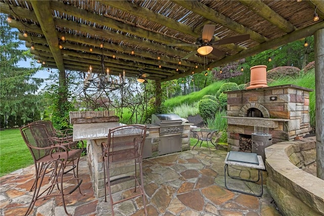 532 Salem Heights Dr, Pine Twp Nal, PA 15044 - view of patio / terrace featuring an outdoor stone fireplace, exterior kitchen, and a ceiling fan