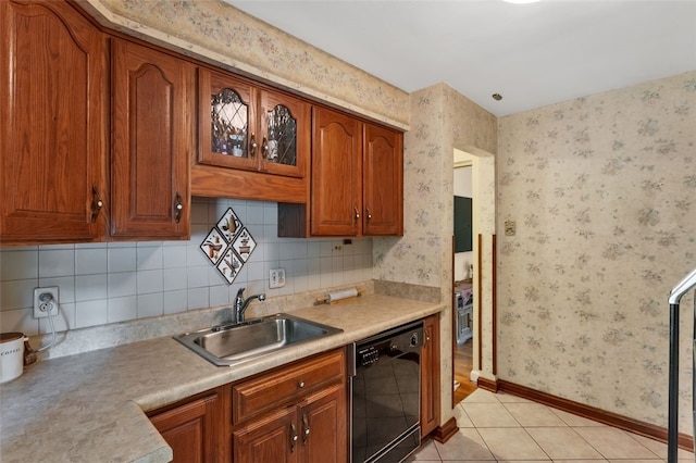 2860 Beaver Rd, Pa, PA 15003 - kitchen with black dishwasher, light countertops, brown cabinets, light tile patterned flooring, and wallpapered walls