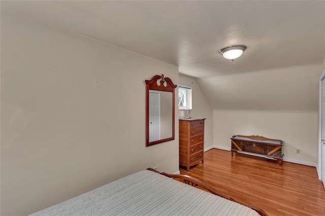 2860 Beaver Rd, Pa, PA 15003 - bedroom with wood finished floors and vaulted ceiling
