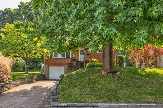 2860 Beaver Rd, Pa, PA 15003 - obstructed view of property featuring concrete driveway, a garage, brick siding, and a front lawn