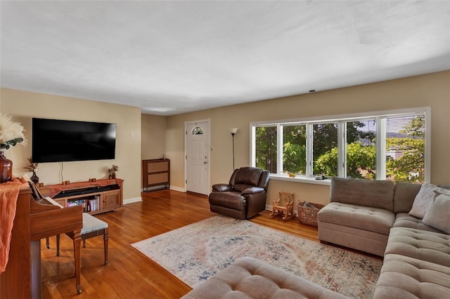 2860 Beaver Rd, Pa, PA 15003 - living area featuring wood finished floors and baseboards
