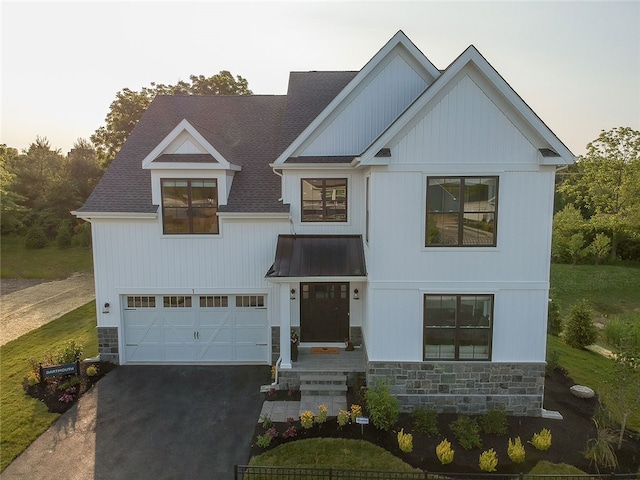 421 Johnston Rd, Saint Clair, PA 15241 - modern inspired farmhouse featuring stone siding, driveway, and an attached garage