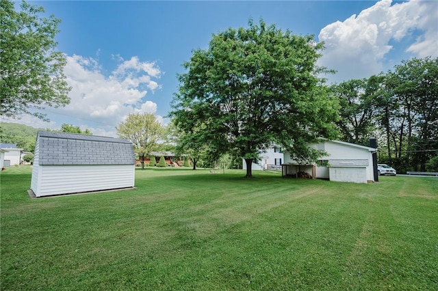 68 Riverside Ave, Center Twp/Homer Cty, PA 15748 - view of grassy yard with a storage shed