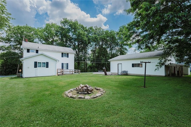 68 Riverside Ave, Center Twp/Homer Cty, PA 15748 - view of grassy yard featuring an outdoor fire pit
