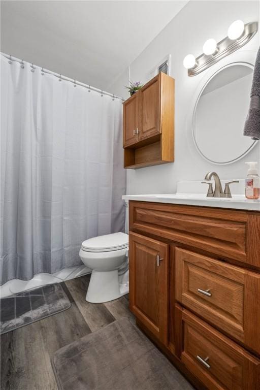 1434 Washington Blvd, Port Vue, PA 15133 - bathroom featuring vanity, wood finished floors, and a shower with shower curtain