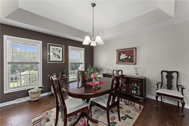 3013 Chessman St, Hampton, PA 15101 - dining room featuring a raised ceiling, a chandelier, and wood finished floors