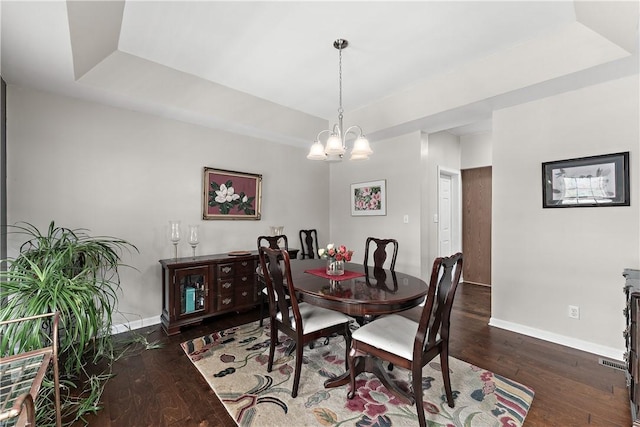 3013 Chessman St, Hampton, PA 15101 - dining area featuring hardwood / wood-style flooring, a tray ceiling, and a chandelier