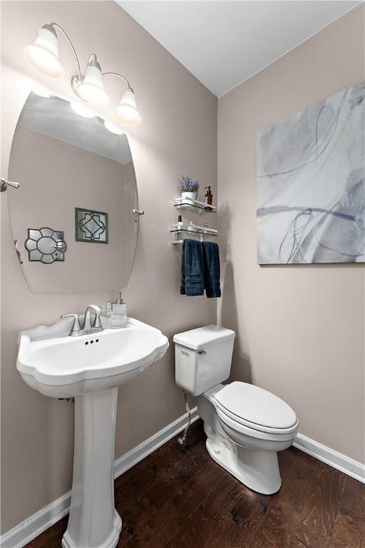 3013 Chessman St, Hampton, PA 15101 - bathroom featuring wood finished floors and toilet