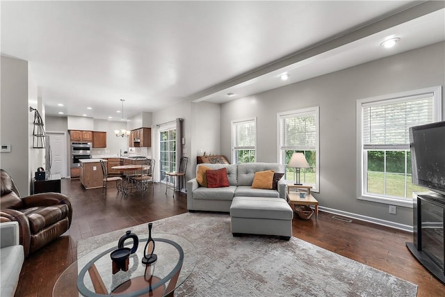 3013 Chessman St, Hampton, PA 15101 - living area with dark wood finished floors, recessed lighting, and a chandelier