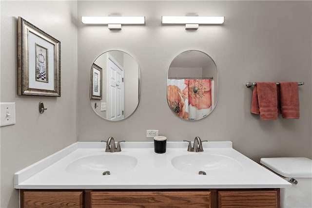 3013 Chessman St, Hampton, PA 15101 - bathroom with double vanity and toilet