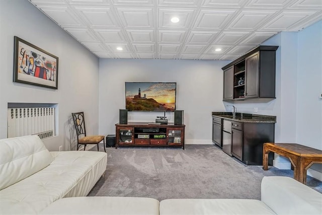 6403 Beacon St, Squirrel Hill, PA 15217 - living area with radiator heating unit, recessed lighting, light colored carpet, wet bar, and an ornate ceiling