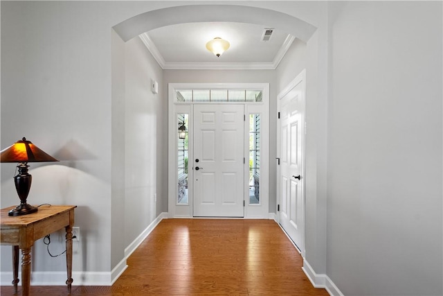 517 Altmyer Fields Ln, Marshall, PA 15090 - entrance foyer with arched walkways, wood finished floors, and ornamental molding