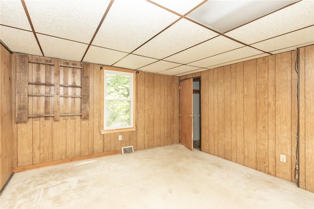 133 2nd, St, PA 15961 - spare room with a paneled ceiling and wooden walls