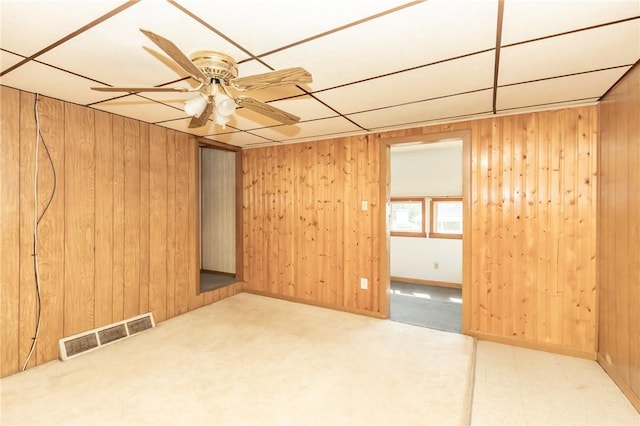 133 2nd, St, PA 15961 - unfurnished room with wood walls and a ceiling fan