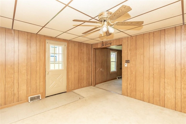 133 2nd, St, PA 15961 - unfurnished room featuring wooden walls and ceiling fan