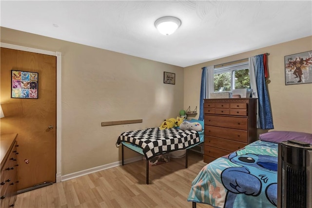 391 Wendel Rd, Pa, PA 15642 - bedroom featuring light wood-style flooring and baseboards