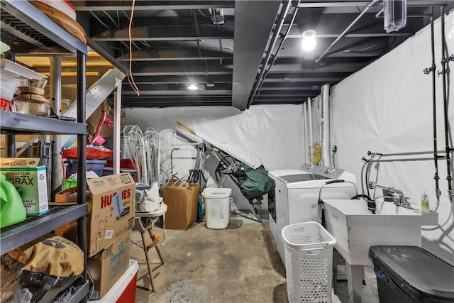 391 Wendel Rd, Pa, PA 15642 - unfinished below grade area featuring separate washer and dryer and a sink
