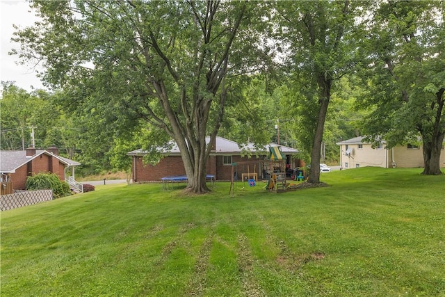 391 Wendel Rd, Pa, PA 15642 - view of grassy yard featuring a trampoline