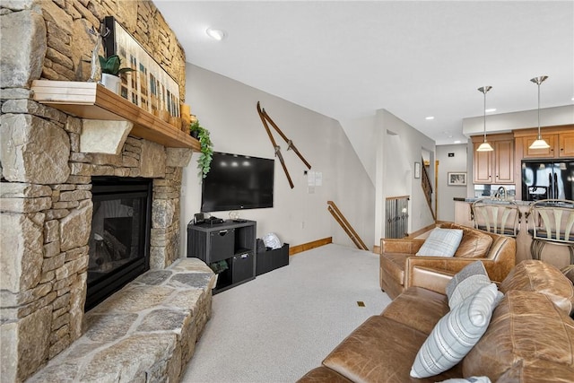 116 Lakeside Trl, Seven Springs Resort, PA 15622 - carpeted living area with a stone fireplace, stairway, and recessed lighting