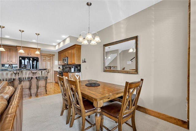116 Lakeside Trl, Seven Springs Resort, PA 15622 - dining area featuring a chandelier, recessed lighting, and light carpet