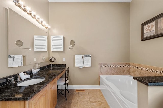 724 Franklin Rd, Pine Twp Nal, PA 16046 - bathroom with vanity, a garden tub, and tile patterned flooring