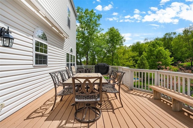 724 Franklin Rd, Pine Twp Nal, PA 16046 - wooden deck featuring outdoor dining area, grilling area, and view of scattered trees