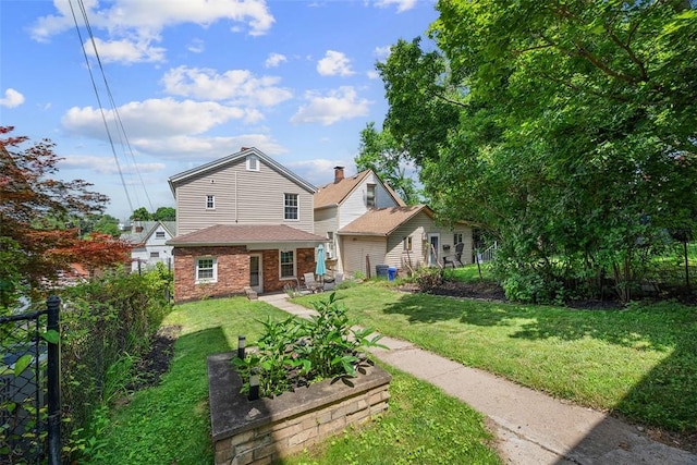 123 Labelle St, Mt Washington, PA 15211 - back of house featuring a lawn and brick siding