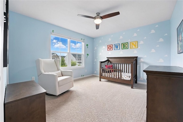 3049 Eagle Ridge Dr, Middlesex Twp, PA 16059 - bedroom with light colored carpet, a crib, and ceiling fan