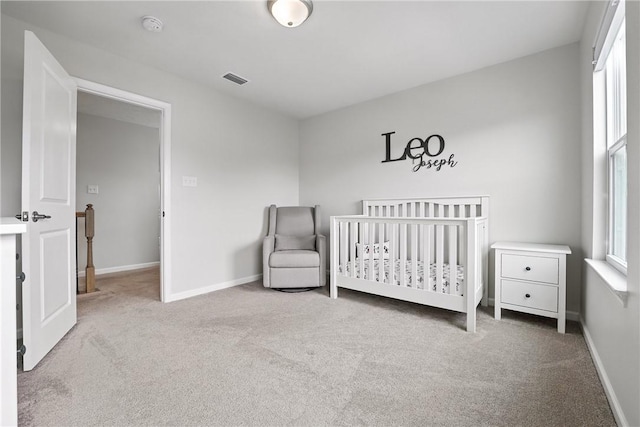3049 Eagle Ridge Dr, Middlesex Twp, PA 16059 - carpeted bedroom featuring baseboards and a crib