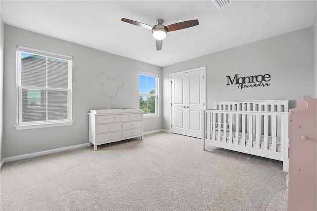 3049 Eagle Ridge Dr, Middlesex Twp, PA 16059 - carpeted bedroom featuring a closet, ceiling fan, and a nursery area