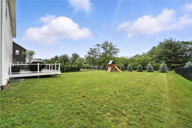 3049 Eagle Ridge Dr, Middlesex Twp, PA 16059 - fenced backyard with a playground and a wooden deck