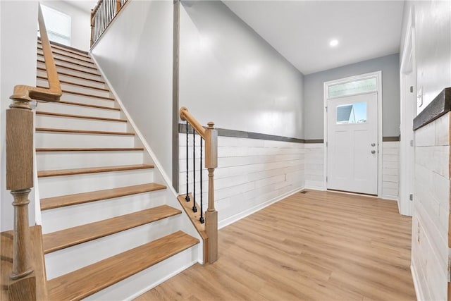 3049 Eagle Ridge Dr, Middlesex Twp, PA 16059 - foyer entrance with a wainscoted wall, light wood-style floors, stairs, recessed lighting, and wooden walls