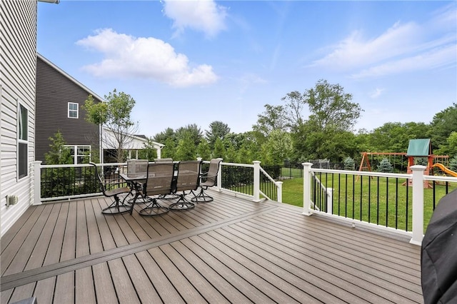 3049 Eagle Ridge Dr, Middlesex Twp, PA 16059 - wooden terrace featuring a playground, outdoor dining space, a fenced backyard, and view of scattered trees