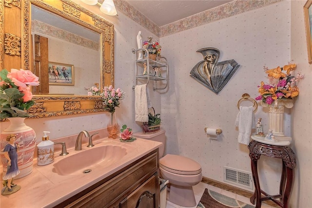 410 Lorenzo Ln, Hempfield Twp, PA 15642 - bathroom with wallpapered walls, vanity, and tile patterned flooring