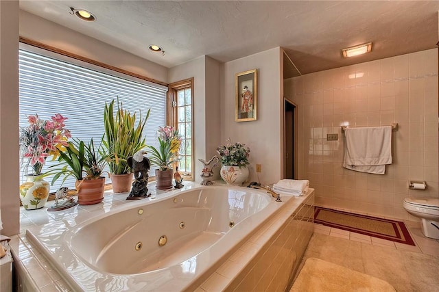 410 Lorenzo Ln, Hempfield Twp, PA 15642 - bathroom featuring a whirlpool tub, tile patterned flooring, and a shower