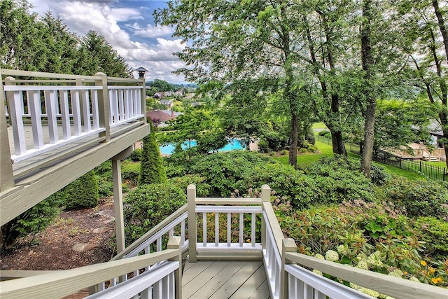 410 Lorenzo Ln, Hempfield Twp, PA 15642 - wooden deck featuring view of wooded area