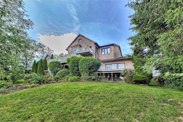 410 Lorenzo Ln, Hempfield Twp, PA 15642 - back of house with a balcony and a yard