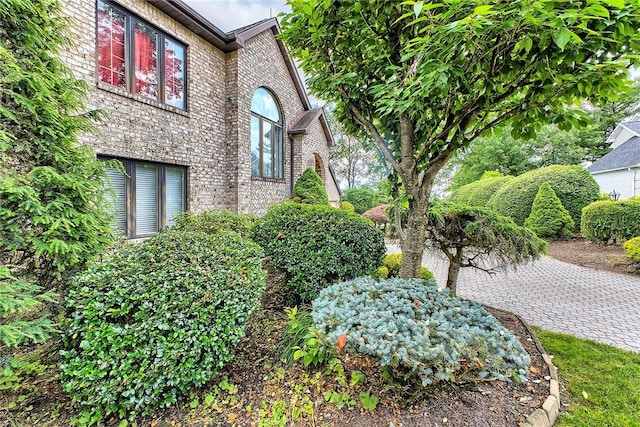 410 Lorenzo Ln, Hempfield Twp, PA 15642 - view of side of property featuring brick siding