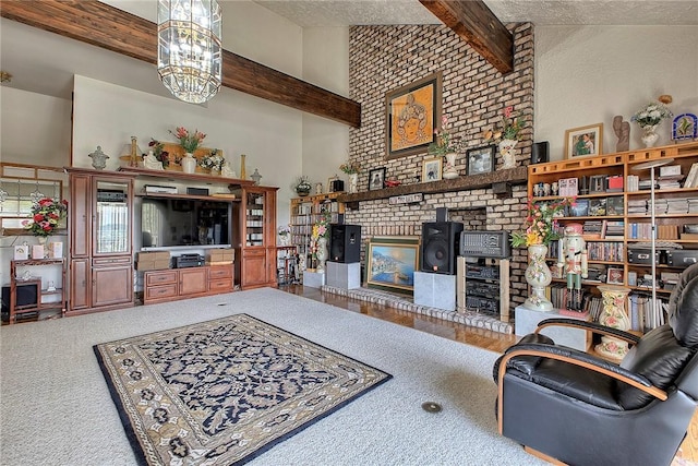 410 Lorenzo Ln, Hempfield Twp, PA 15642 - living room with beam ceiling, a brick fireplace, and a chandelier