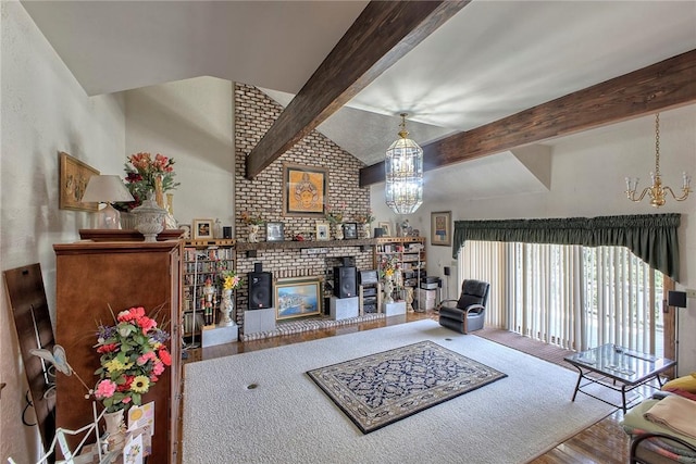 410 Lorenzo Ln, Hempfield Twp, PA 15642 - living room featuring a chandelier, wood finished floors, and a brick fireplace